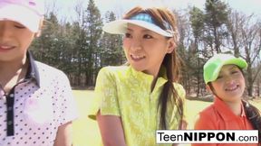 Cute Asian teen girls play a game of strip golf