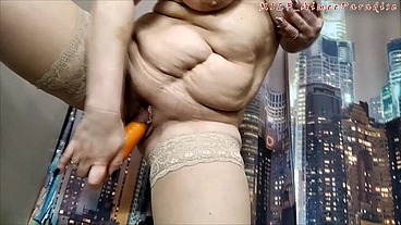 Carrots and zucchini in the sweet cunt of a mature secretary...
