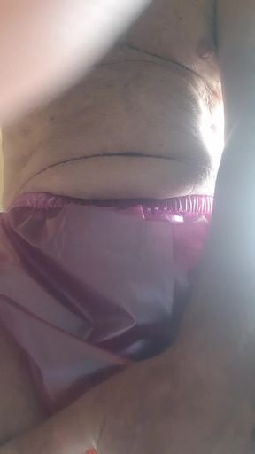 Pissing in rubber panties