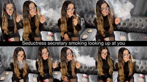 Seductress secretary smoking marlboro red 100s looking up at you