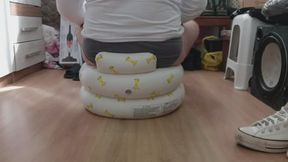 100kg person sitting in a small inflatable armchair designed to support a maximum of 15kg.