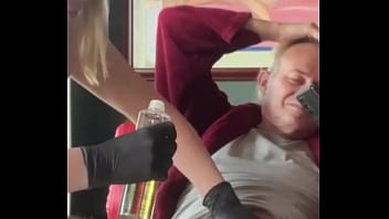 A very sensual moment of applying oil to the cock after waxing
