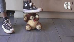 Poor Teddy under her Chucks