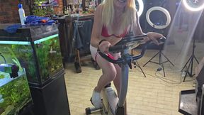 Cute 19 Year Old Blonde Riding Excersize Bike with Massive Dildo