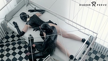 Latex-Patient gets an anal inspection in the clinic bed