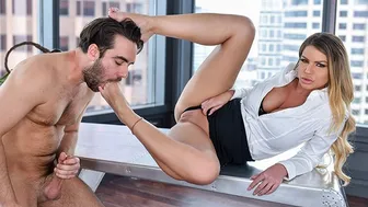 Blonde boss Brooklyn Chase gives a footjob to her employee in the office
