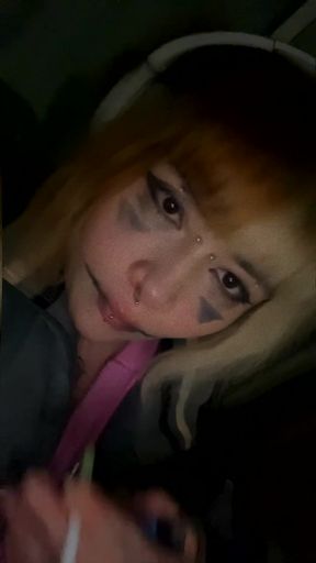 Gothic emo girl with clown makeup