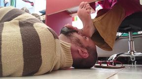 Foot rest under table