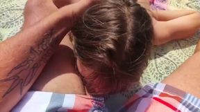 Sexy milf enjoys footjob on Tenerife beach in public