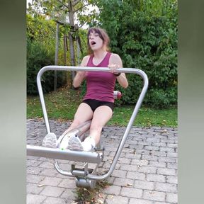 Outdoor workout with vibrator for ass and cock! Tranny cums straight into her shorts!