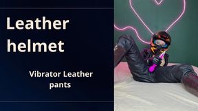 helmet, leather pants and vibrator