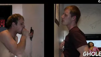 Twink gets his cock sucked through a gloryhole