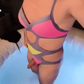 Tranny wearing sexy swimsuit in pool