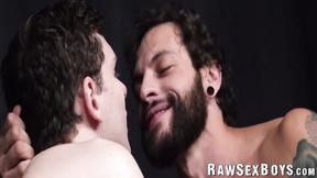 ”Muscular tatted hunk Eddie Danger asserts his dominance over twink Ethan Tate”