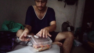 gainer gobbling a large slip of pizza