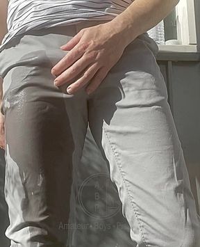 Jules Wets His Grey Pants and Exposes His Semi-hard Cock Through His Trousers