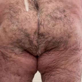 Bear Shoves Dildo up His Ass Before Showering