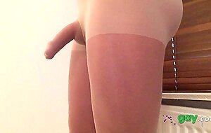 Close up cock in sheath pantyhose .