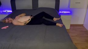 Bonie lies there half-naked and gets it to orgasm while my cock swings into her tack