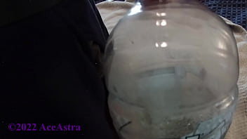 Pissing in a Gatorade Bottle Closeup