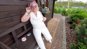 Smoking Granny Massaging Her Breasts Outdoors