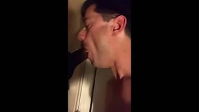 Amateur sucks big black cock at glory hole