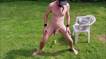 naked pathetic slave in penis cage during outdoor party entertain guests with nettle play, pee in 2 direction