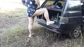 girlfriend squirts several times in a row in a public place near the car