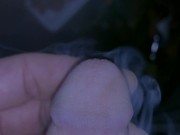 Pissing with my cigarette still smoking between my fingers