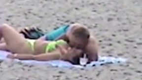 Filming a horny man on the beach trying to seduce his bootyful girlfriend