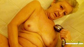 Grandma rubbing her juicy pussy in bathroom and gets orgasm