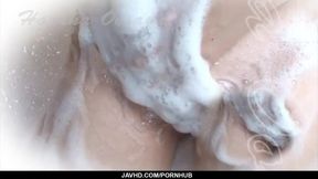 Sexy Asian girl Haruka Oosawa gets soaking wet in the shower and gives
