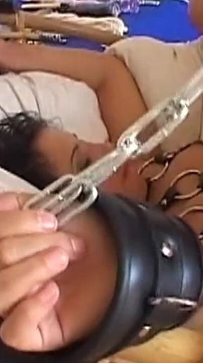 Mature Brunette MILF in Chains Deepthroats and Rides Hard