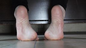 Blaize Matrix Flexing Her Feet Under Her Desk