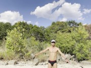Sweaty runner does exercises outside