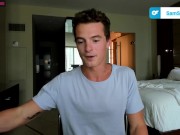 Young fit guy jerks his cock on a livestream