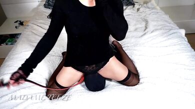 Madame Teeze's face sits smother her breath thick and heavy