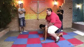 Girl dominates boy in foot fetish play