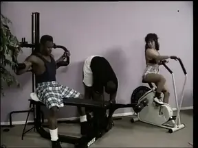 Stunning blonde babe with big tits gets targeted by two black guys at the gym