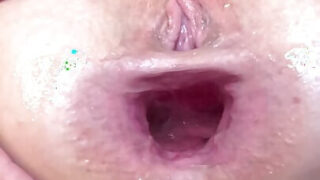 Busty slut stretched by intense fisting