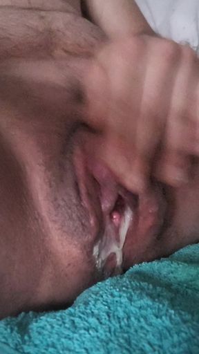 Horny transgender male plays with creamy pussy