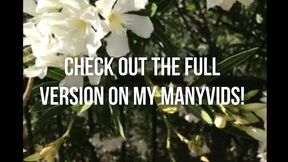 big boobed teen pleasures herself in a public garden