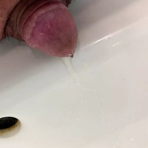 Small penis takes a pee