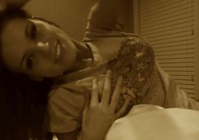 Sassy and bosomy young brunette shows her breasts and pussy