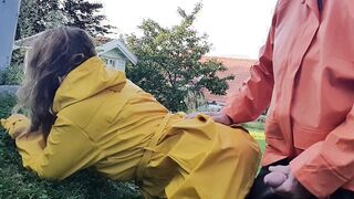 HornyMILF getting filled with gigantic cock wearing rainwear and latex boots outdoor