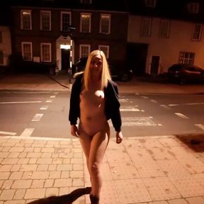 Young blonde wife walking nude down a high street in Suffolk