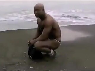 Asian Bodybuilder At The Beach In Various States Of Nakedness