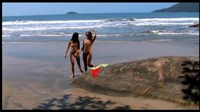 girls getting wild on a beach