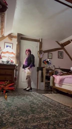 Dressed in a small pink skirt for an evening