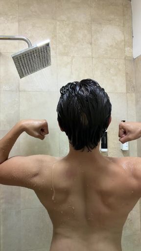 Flexing my muscles in the showers   Clip 1